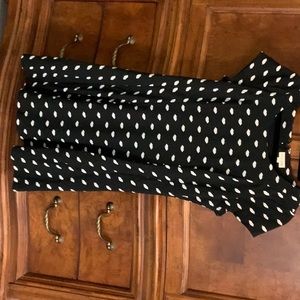 NWOT black with white lips, tailored with flair bottom. Size large.